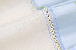 SCAMPOLO TENDINO BIANCO CON BORDO FLOREALE AZZURRO