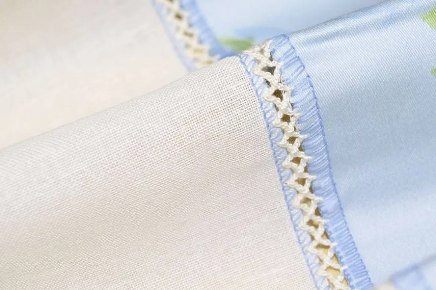 SCAMPOLO TENDINO BIANCO CON BORDO FLOREALE AZZURRO