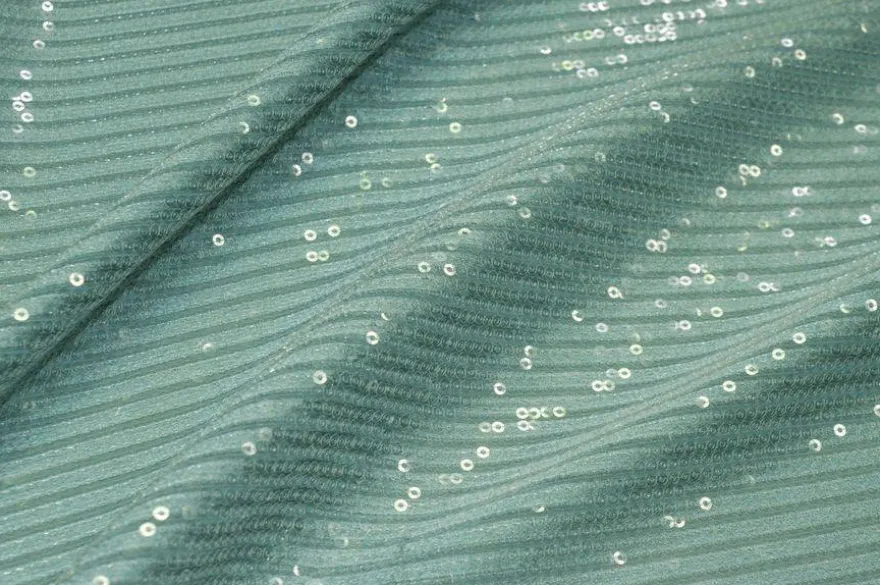 TESSUTO CON PAILLETTES CUCITE VERDE SALVIA