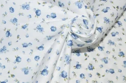 TESSUTO COTONE FANTASIA FIORELLINO AZZURRO