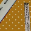 TESSUTO CREPE ELASTICIZZATO FONDO SENAPE BOLLO PANNA