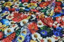 TESSUTO CREPE FANTASIA FLOREALE CON PAILLETTES APPLICATE