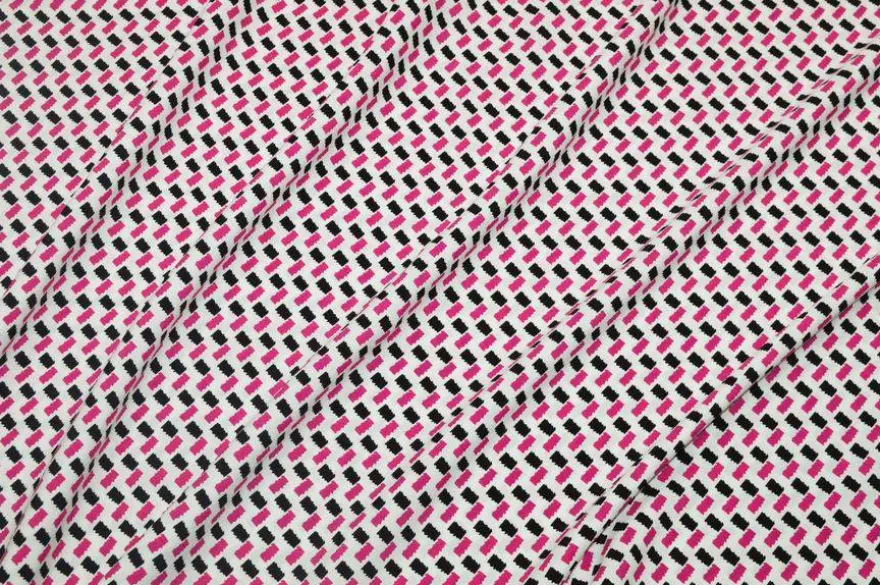 TESSUTO CREPE PURA VISCOSA FANTASIA GEOMETRICA FUCSIA NERO