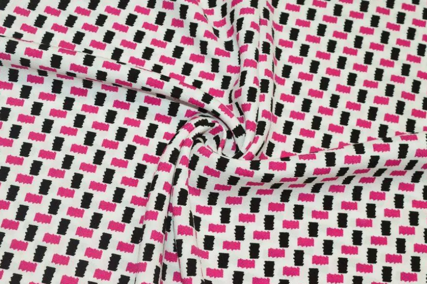 TESSUTO CREPE PURA VISCOSA FANTASIA GEOMETRICA FUCSIA NERO