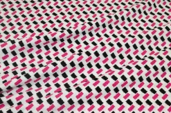 TESSUTO CREPE PURA VISCOSA FANTASIA GEOMETRICA FUCSIA NERO
