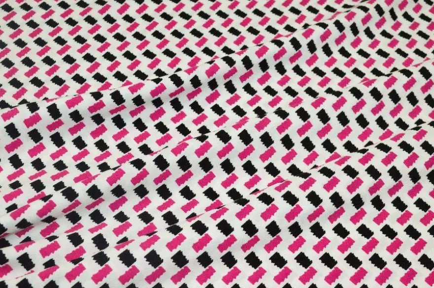 TESSUTO CREPE PURA VISCOSA FANTASIA GEOMETRICA FUCSIA NERO