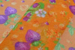 TESSUTO CREPON PURA SETA DISEGNO FRUIT ARANCIO
