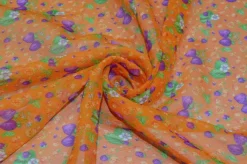 TESSUTO CREPON PURA SETA DISEGNO FRUIT ARANCIO
