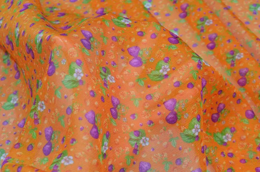 TESSUTO CREPON PURA SETA DISEGNO FRUIT ARANCIO