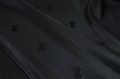 TESSUTO FODERA ELASTICIZZATA NERA CON LOGO