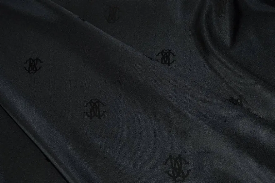 TESSUTO FODERA ELASTICIZZATA NERA CON LOGO