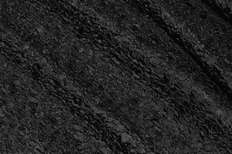 TESSUTO GOFFRATO STRETCH NERO