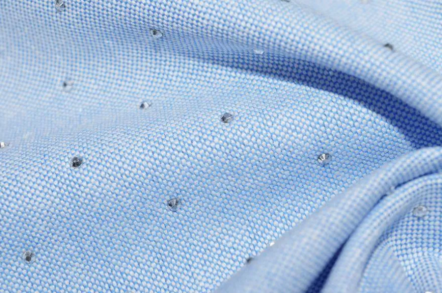TESSUTO JEANS CON APPLICAZIONI STRASS