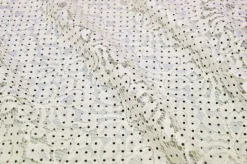 TESSUTO JERSEY DI PIZZO PANNA CON POIS NERI