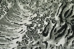TESSUTO MAGLINA A BALZE ANIMALIER
