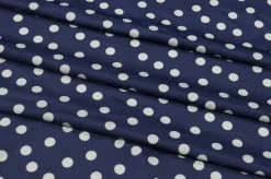 TESSUTO MAGLINA A POIS BLU