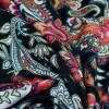 TESSUTO MAGLINA IN VISCOSA FANTASIA CASHMERE FONDO NERO