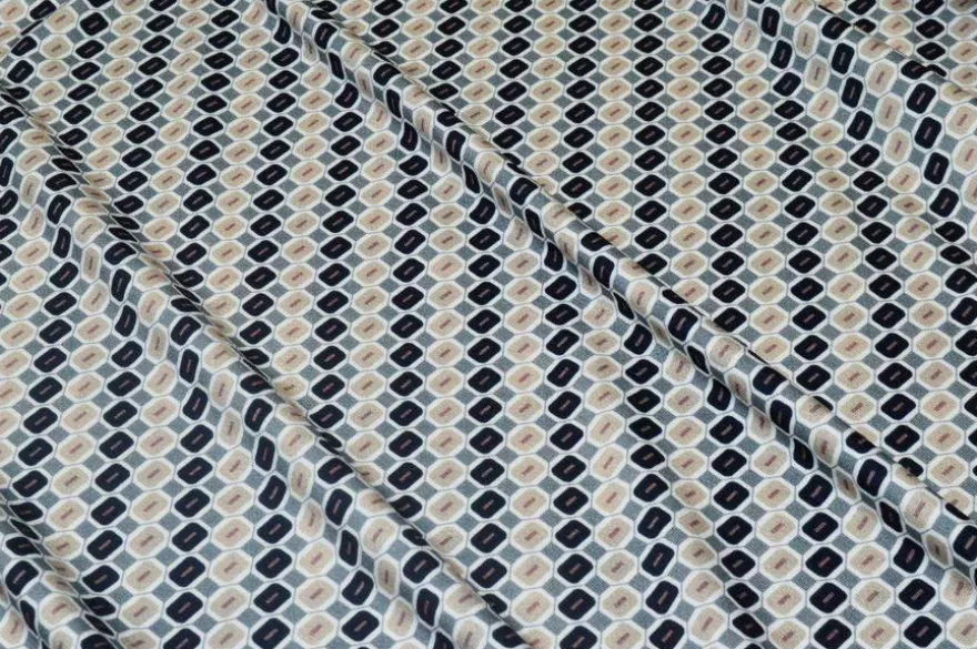 TESSUTO MAGLINA IN VISCOSA FANTASIA GEOMETRICA BLU