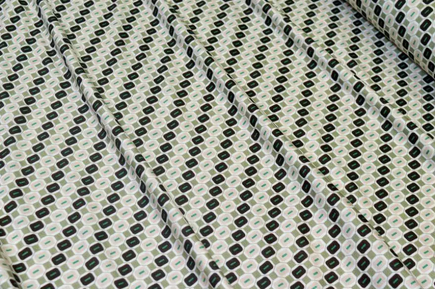 TESSUTO MAGLINA IN VISCOSA FANTASIA GEOMETRICA VERDE