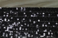 TESSUTO PAILLETTES CUCITE NERO FONDO TULLE
