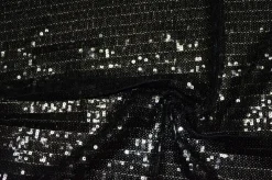 TESSUTO PAILLETTES CUCITE NERO FONDO TULLE
