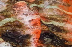 TESSUTO PIZZO CON VOLANT SFUMATO MARRONE ARANCIO