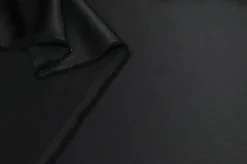 TESSUTO RASONE NERO ELASTICIZZATO