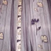 TESSUTO TENDA ORGANZA CON FIORE VIOLA RICAMATO