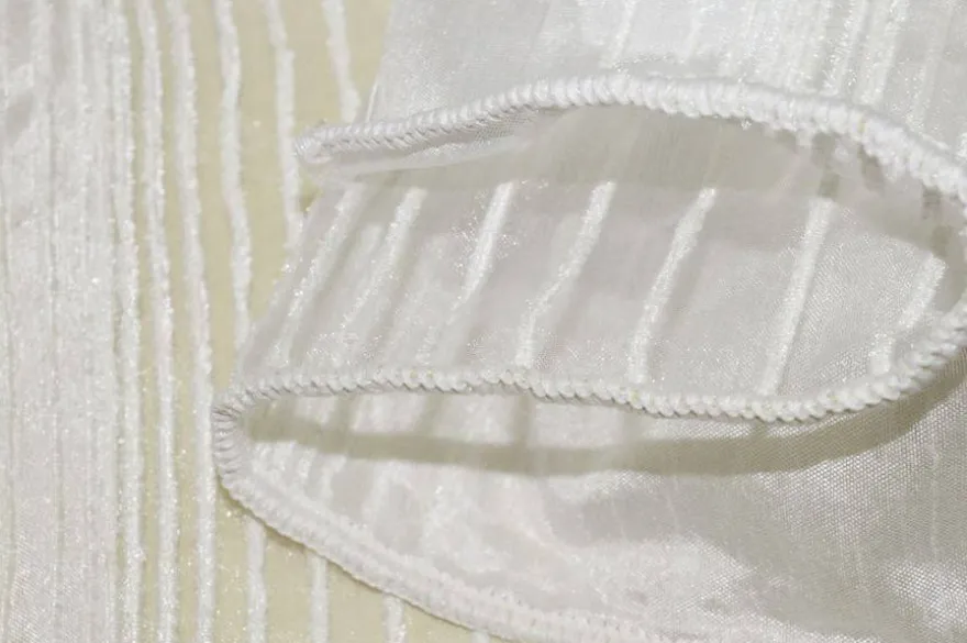 TESSUTO TENDA ORGANZA CON RIGHINA IN CINIGLIA