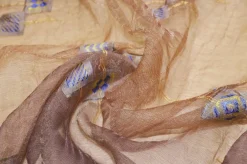 TESSUTO TENDA ORGANZA STROPICCIATA FANTASIA GEOMETRICA ORO BLU