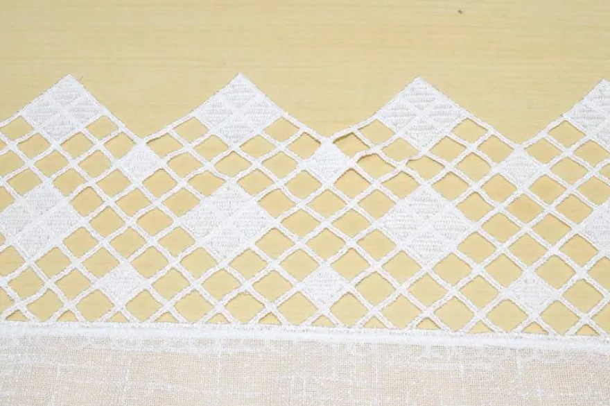 TESSUTO TENDINO EFFETTO LINO CON INSERTI MACRAME