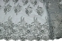 TESSUTO TULLE RICAMATO CON PAILLETTES